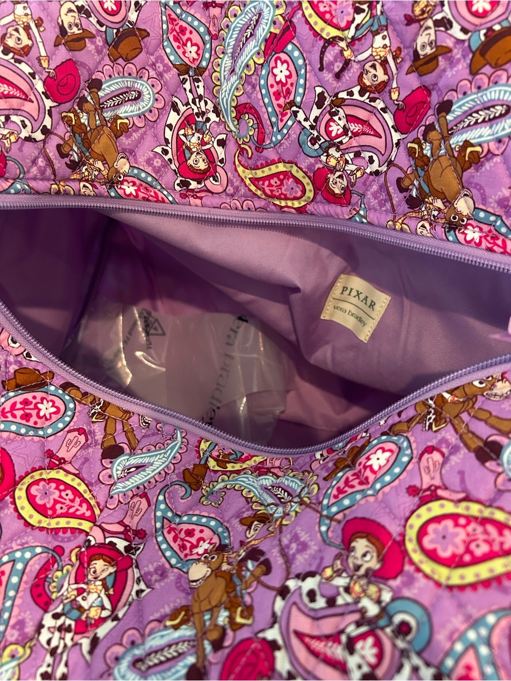 NWT Disney Pixar Toy Story Rodeo Paisley Purple Large Duffel Bag - Picture 8 of 10